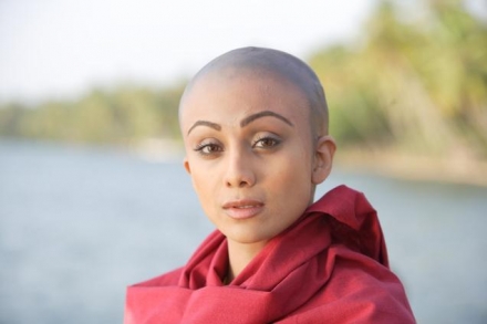 The film has Shilpa Shetty and Chinese actor Xia Yu playing the lead roles. It is a story about dance, music, art, philosophy and love. The pic above shows Shilpa Shetty as a tonsured sanyasin (renouncer) clad in a monk’s robe. However, Shilpa did not shave her head for the role. Rather, she used prosthetic make-up to get the bald look. Each make-up session lasted about three hours.  The Desire is directed by R. Sarath and also stars Anupam Kher, Jayapradha, Vikram Gokhale, and Asif. The film has music by Shankar Ehsaan Loy and Pandit Vishwamohan Bhatt. The movie has been shot in Kerala, Gujarat, Maharashtra, and Andhra Pradesh in India and in various locales in Malayasia. The Desire premiered at the Geneva International Film Festival, where it won the best narrative feature film award. Now, it heads to New York City International Film Festival, 2011, where it will be screened on August 24.